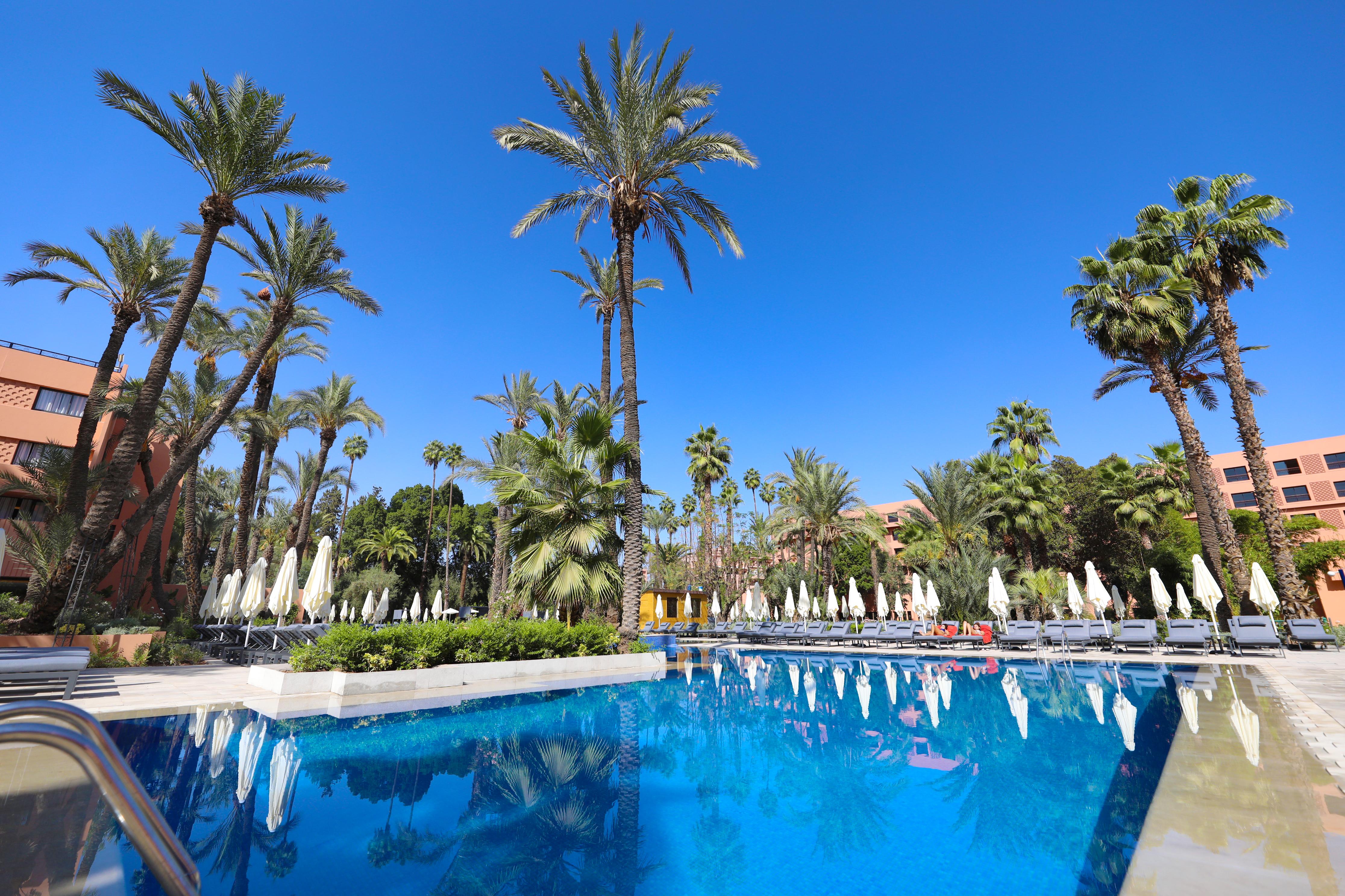 מלון מרקש Kenzi Farah מראה חיצוני תמונה A swimming pool in a hotel in Morocco